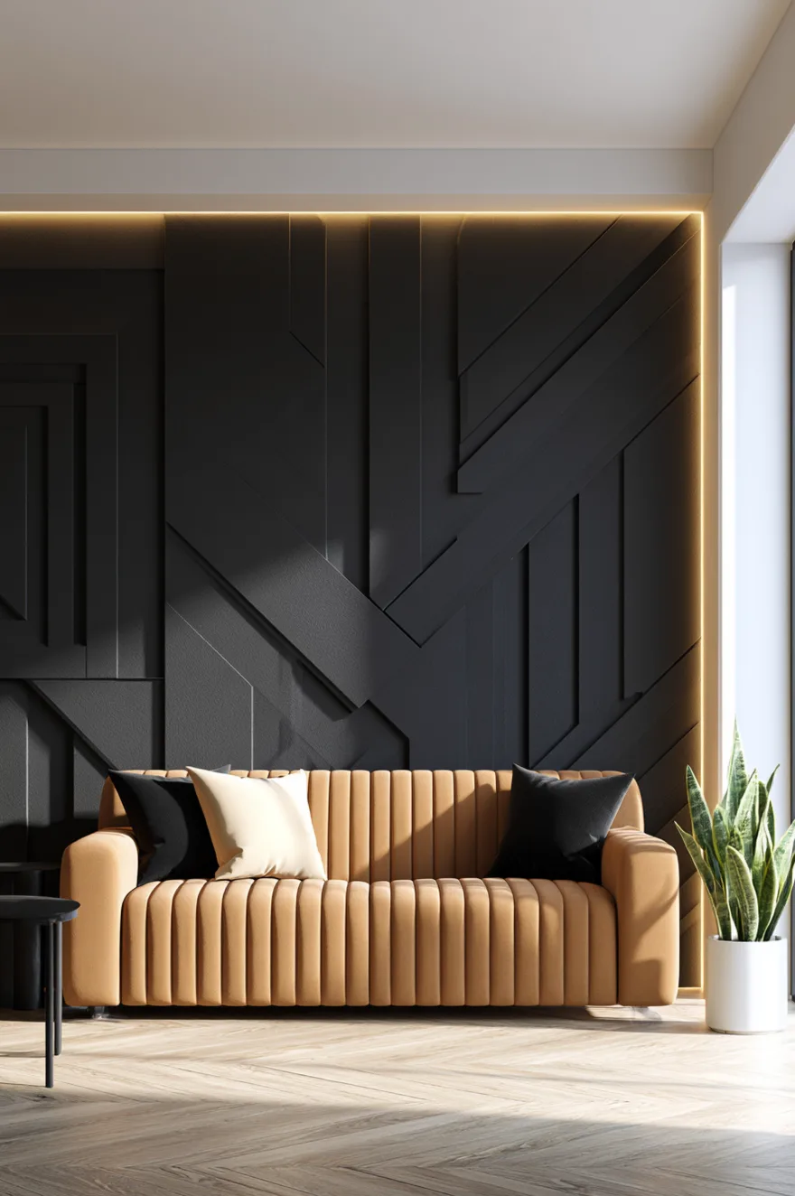 Architectural multi-dimensional geometric wood paneling in matte black with hidden linear side backlighting and a ribbed ochre velvet sofa.